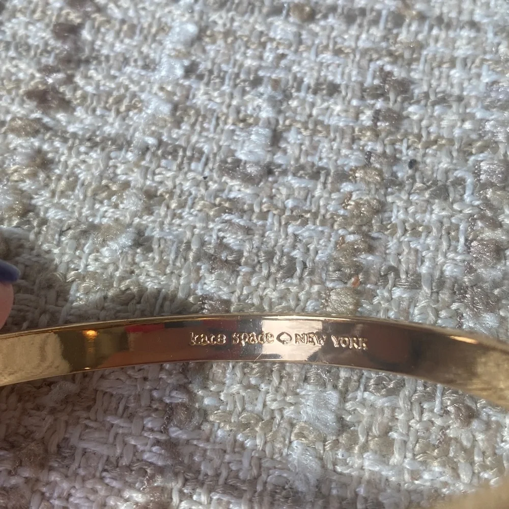 Kate Space Enamel Bow Bangle Bracelet - Picture 3 of 3